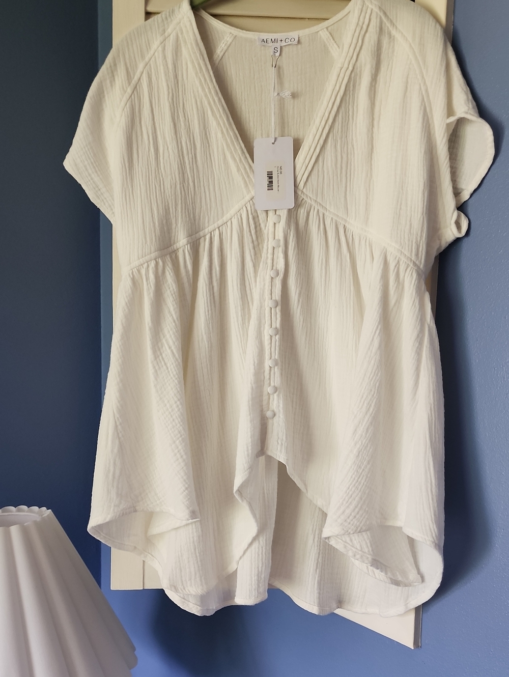 AEMI+CO White V-Neck Button-Front Peasant Top